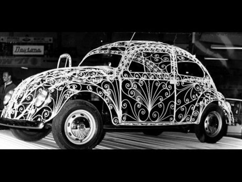 a car in a tradeshow of 1970s
