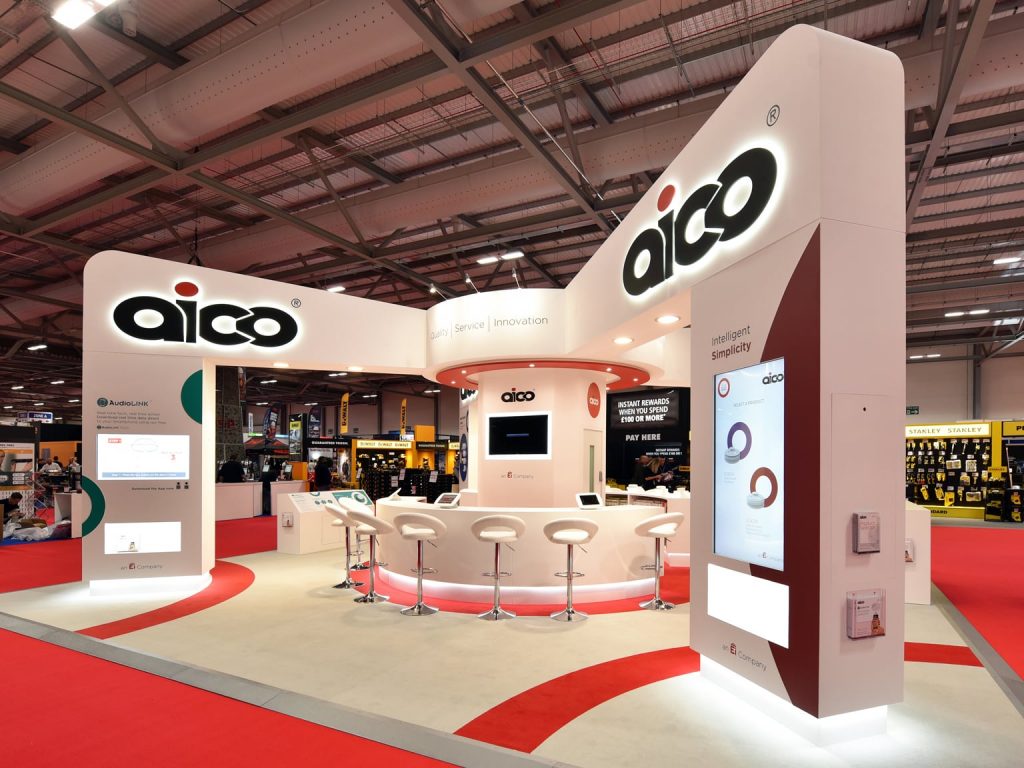 Full custom trade show booth with red and white colour scheme