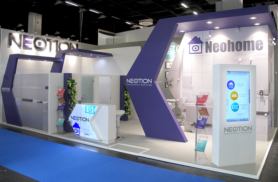 Custom trade show stand with purple branding and custom shapes